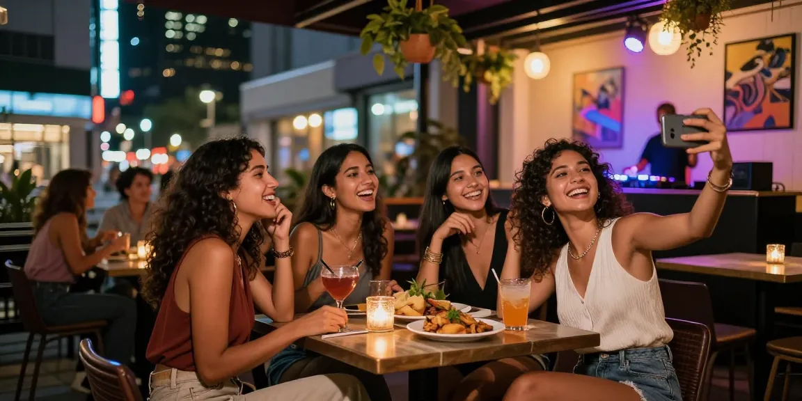 Những cô gái gọi đang vui vẻ thưởng thức đồ uống tại quán bar sôi động vào buổi tối